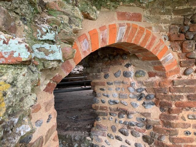 New brick arch at #baconsthorpecastle to carry the fragile wall above. Not guesswork - the springers were still there which gave the angle. Nice work from an experienced mason. The arch curves horizontally as well as vertically. #brickwork #medievalarchitecture #norfolk #heritage